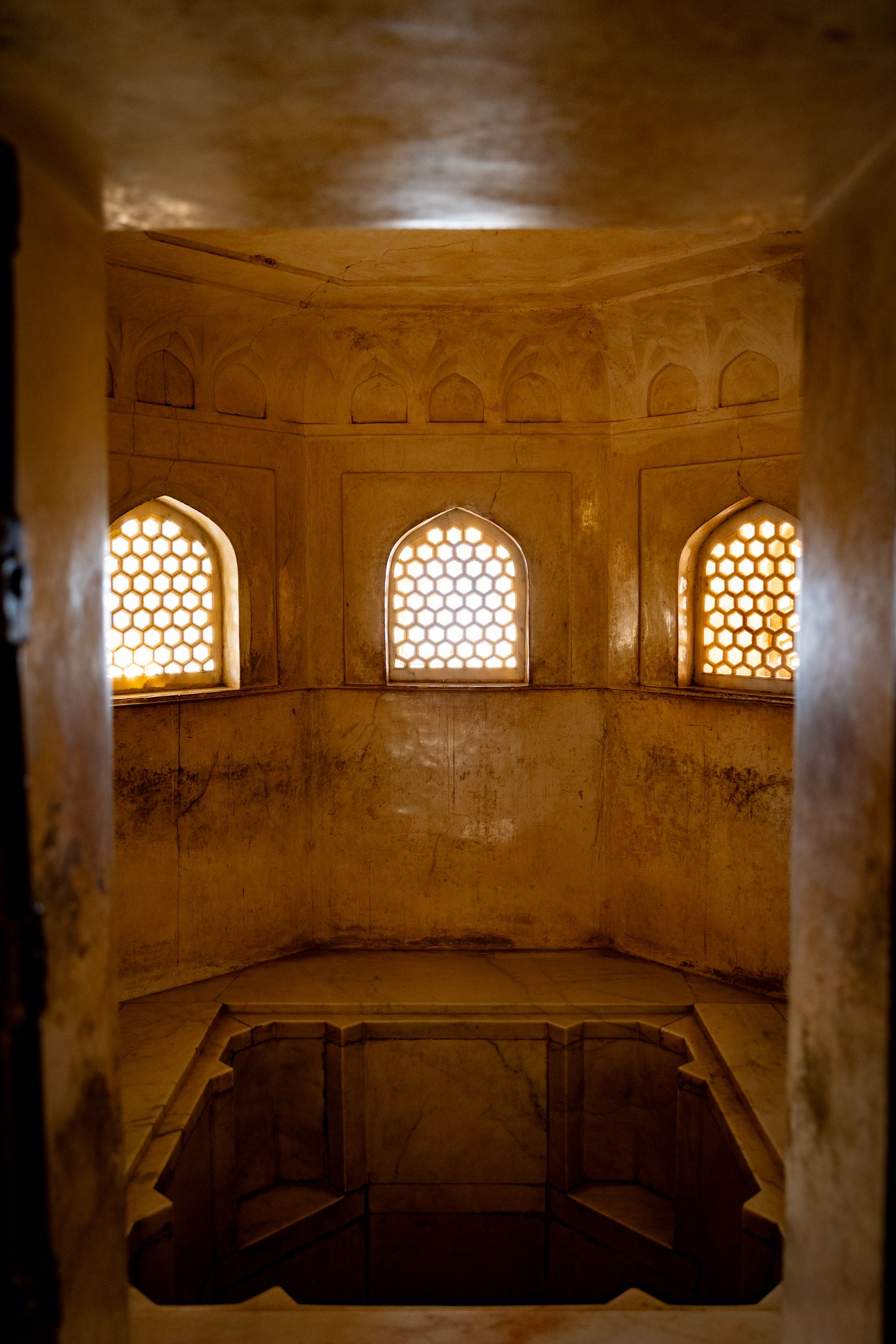 Chamber With Three Glowing Lattice Windows